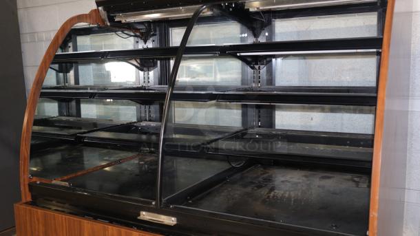 Structural Concepts H5C5650LR display case, refrigerated/non-refrigerating, curved glass, 120V, self-contained, wood trim.