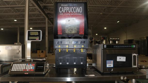Curtis CAFEPC4CS10000, 4 Flavor Primo Cappuccino Dispenser in good condition, featuring flavor selection buttons and branding.