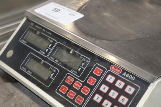 Berkel A600 scale for deli/produce, features digital display and keypad, used condition, item tag 59 visible.