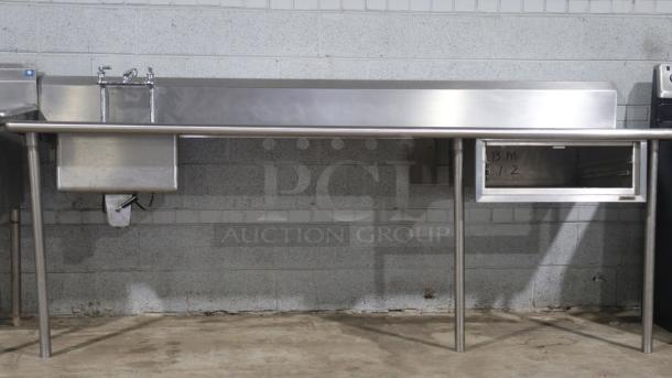 101.5" stainless-steel counter with integrated sink, sturdy legs, and storage compartment, ideal for baking and cooking.
