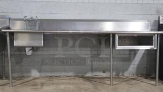 101.5" stainless-steel counter with integrated sink, sturdy legs, and storage compartment, ideal for baking and cooking.