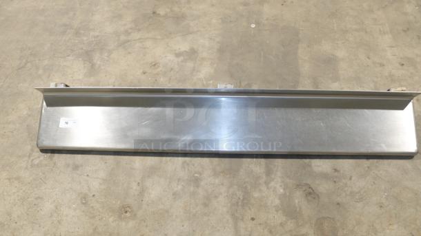 76" stainless-steel storage shelf, sleek design, minor surface wear, auction tag "16" visible, excellent for industrial use.