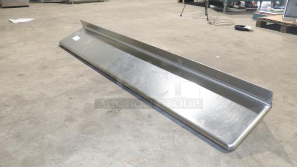 76" stainless-steel storage shelf, durable construction, excellent condition, includes mounting brackets. Suitable for industrial use.