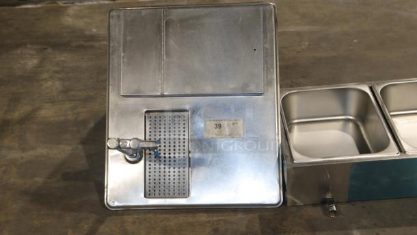 Regency stainless steel water station with ice bin and glass filler, model 600diwibf2118, 18"x21", sleek condition.