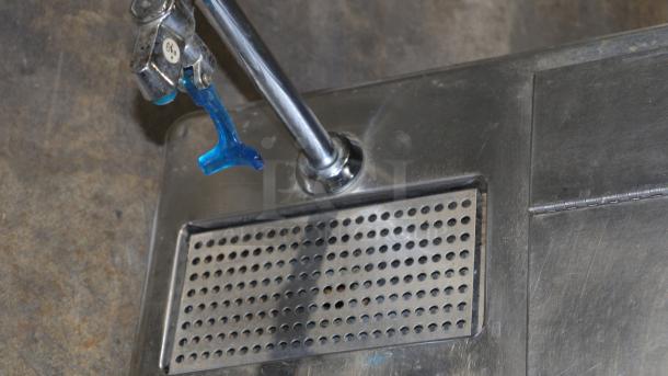 Regency stainless steel water station, model 600diwibf2118, features ice bin and glass filler. Dimensions: 18" x 21".