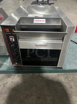 Wyott AT-10 Conveyor Toaster, excellent used condition, 208/240V, tested working. "CAUTION HOT" labels displayed.
