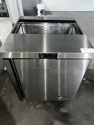 Stainless steel BERG BERS27 sandwich prep table with 8-pan capacity and 1-door. Good condition, visible scuffs. BERG logo on front.