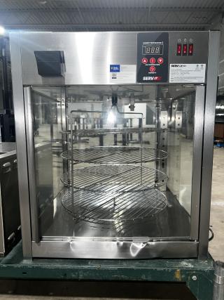 SERVIT 423PDW18D1 18" full-service pizza warmer with digital controls, three shelves, stainless steel frame, excellent condition.