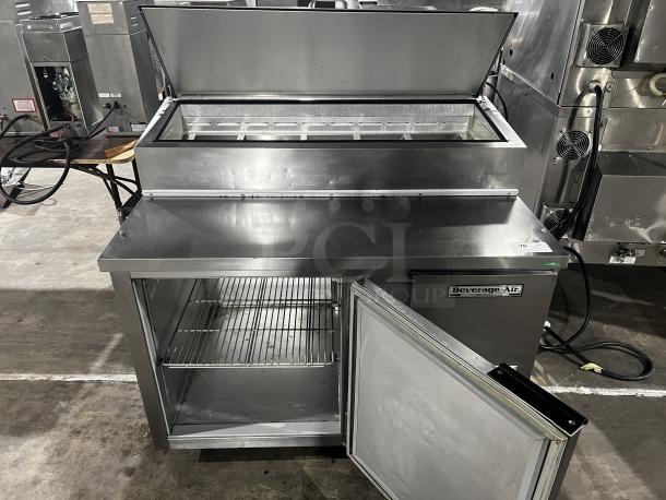 Beverage-Air DP46HC pizza prep table, stainless steel, commercial-grade, open storage door, visible label, excellent condition.
