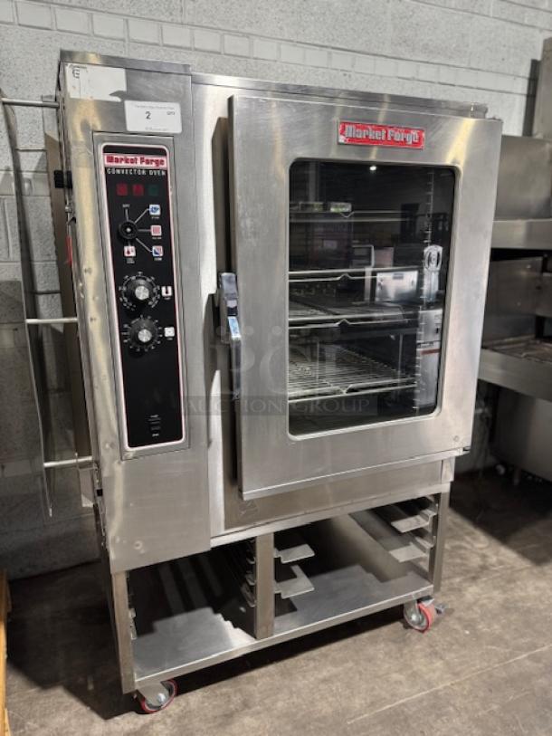 Almost new Market Forge MFC-101 S/AA electric combi commercial steamer; stainless steel, visible control panel, interior racks.