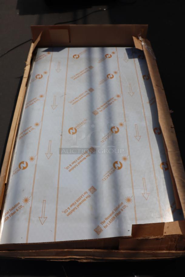 Advance Tabco TFLG-365 36"x60" stainless steel work table, new condition, with protective wrapping, featuring 1.5" backsplash.