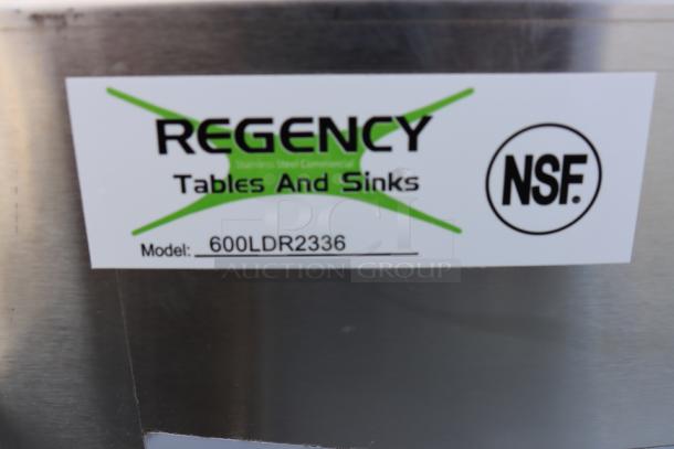 BRAND NEW Regency 36" five-tier stainless steel liquor display rack, model 600LDR2336, minor scratches and dings.