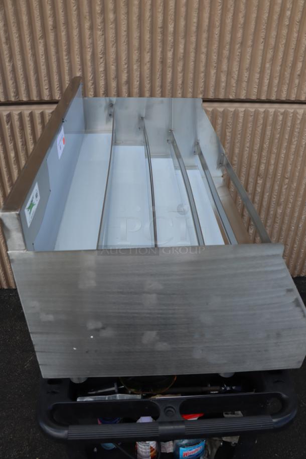 Brand new Regency 600LDR2336 36" stainless steel liquor display rack, five-tiered, 23" deep, minor scratches visible.