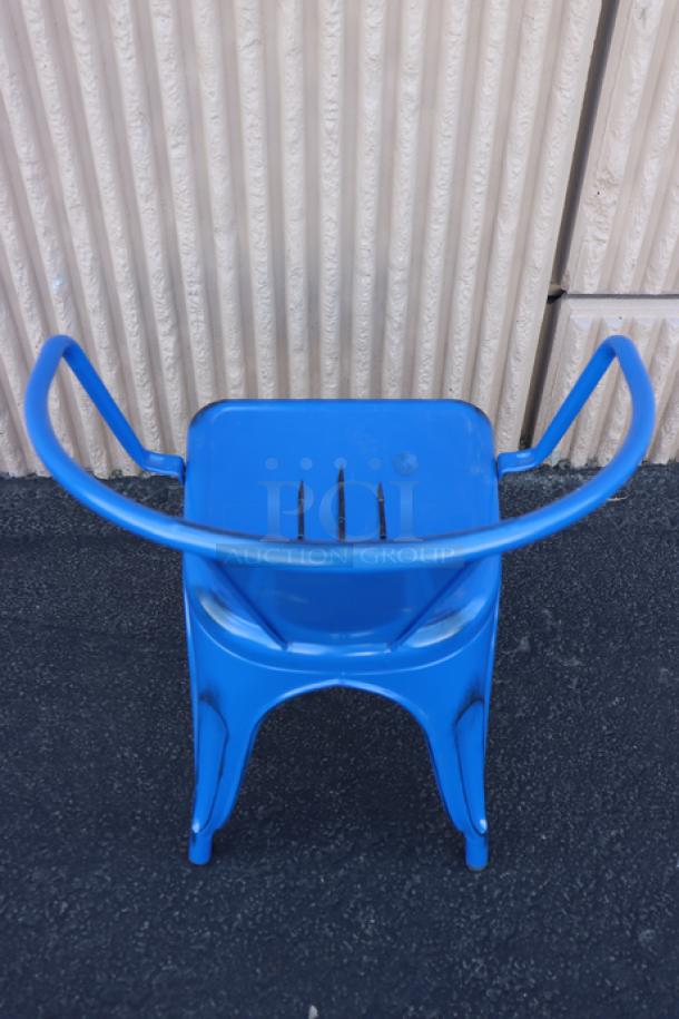 Brand new Lancaster Table & Seating Alloy Sapphire outdoor arm chair, model 164CMARMNVY, vibrant blue finish.