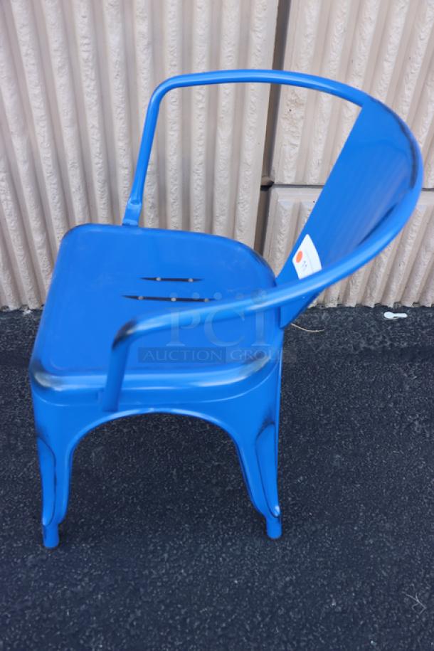 Brand new Lancaster Table & Seating Alloy Sapphire Outdoor Arm Chair, model 164CMARMNVY, vibrant blue color.