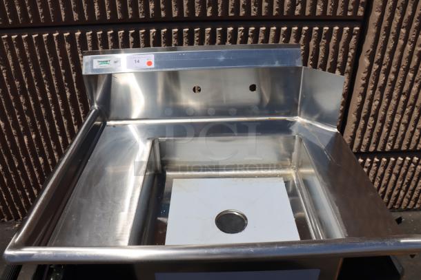 Brand new Regency 600DDT36L 3' soiled dish table, left drainboard. Stainless steel, 16 gauge, minor scratches visible.