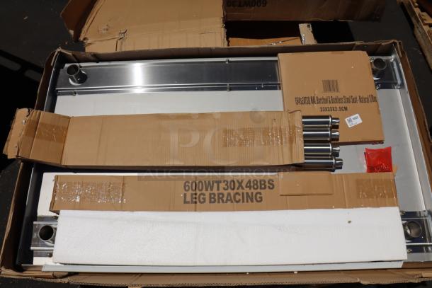 Brand new Regency 600WT30X48BS 30"x48" stainless steel work table with 4" backsplash. Open base, 16-gauge, scratch-n-dent condition.