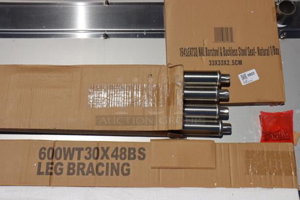 Brand new Regency 600WT30X48BS work table in packaging, 16-gauge 304 stainless steel, with 4" backsplash. Scratch-n-dent sale.