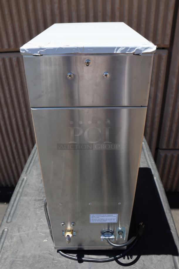 Brand new Curtis D500GT12A000 automatic airpot coffee brewer, 120V, digital controls, visible scratch-n-dent condition.