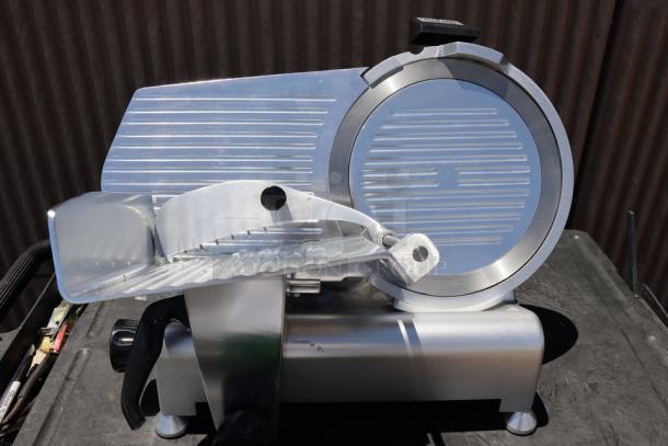 Avantco SL312 12" Manual Meat Slicer, 1/3 hp, 120V. Out of original packaging, with scuffs and scratches. Serial: 03 017525 SL312.