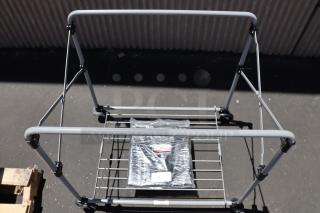 Brand new Rubbermaid® 1881750 collapsible X-Cart, 8 bushel capacity, without original packaging, durable metal frame.