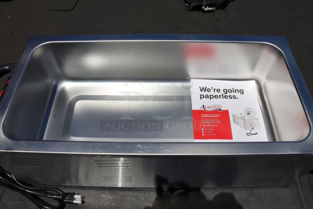 Avantco W43 electric food warmer, 12" x 27", 120V, 1500W. Brand new, light scratches, box damaged. Serial No. 20241104965.