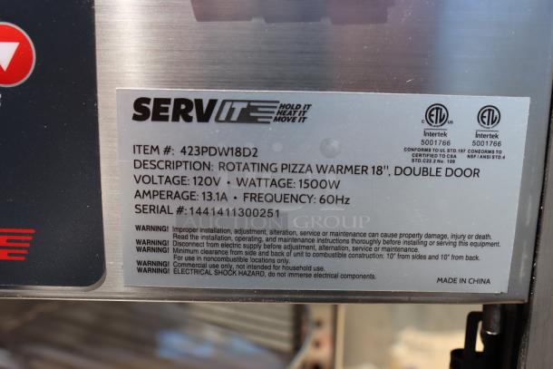 Alt text: ServIt PDW18D2S 18" Countertop Display Warmer label, showing specs: 120V, 1500W, S/N: 1441411300251. Missing glass panel.