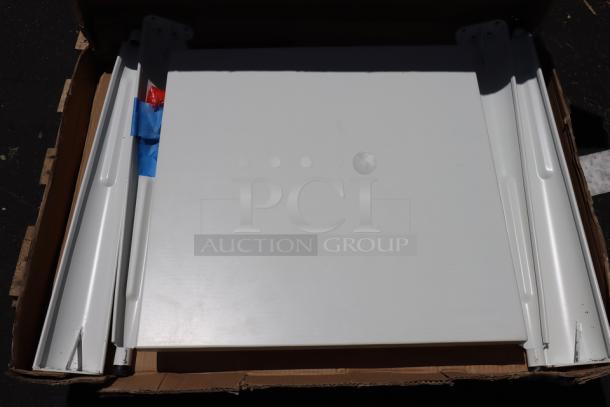 Brand new Lancaster Table & Seating Alloy 24" x 24" outdoor table, model 164RD242YEL, with minor box damage.