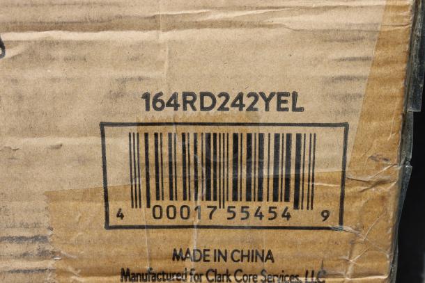 Damaged box with barcode and model "164RD242YEL," Lancaster Table & Seating outdoor table, potential minor scratches.