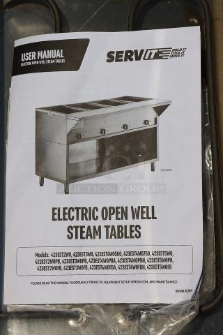 BRAND NEW ServIt five-pan open well steam table, model 423EST5WOPB, shown with user manual. Some dents.