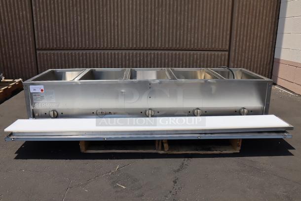BRAND NEW ServIt 5-Pan Electric Steam Table, Model 423EST5WOPB, with superficial dents and dings, partially enclosed base.
