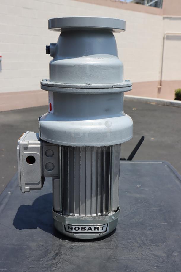 BRAND NEW Hobart FD4/125-1 Commercial Garbage Disposer, 1 1/4 hp, visible superficial scratches, unboxed, serial: 104010862-TBA.