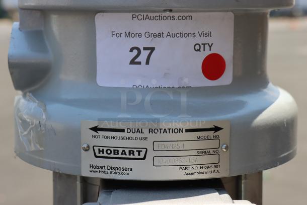 BRAND NEW Hobart FD4/125-1 garbage disposer, 1 1/4 hp, 208-240/480V, model label visible, minor scratches, s/n: 104010862-TBA.