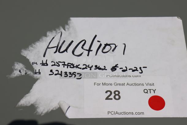 Label with handwritten auction details and Lavex model 275FSUC24362. Red dot sticker and website link visible.