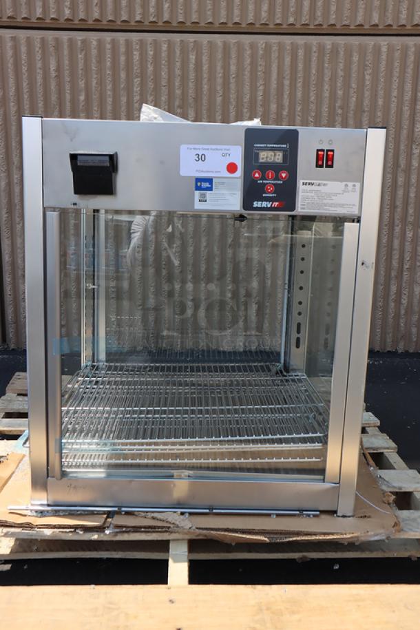 ServIt PDW18D2S countertop display warmer, brand new, 18", 4 shelves, 120V, minor denting, missing glass on one side.