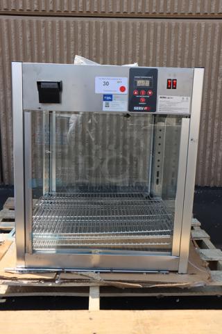 ServIt PDW18D2S countertop display warmer, brand new, 18", 4 shelves, 120V, minor denting, missing glass on one side.