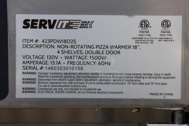 ServIt PDW18D2S 18" display warmer label, 120V, 1500W, S/N: 1460303010158. 4 shelves, missing side glass, minor denting.