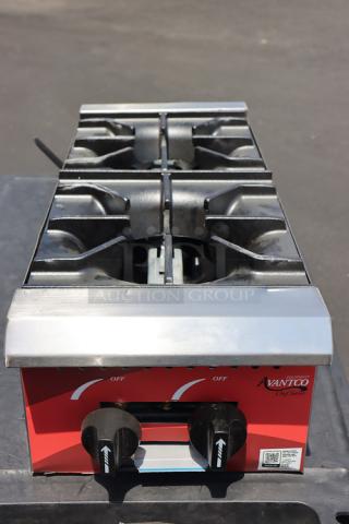 Avantco Chef Series CAG-R-2-12 gas range, 12" 2 burners, 50,000 BTU. Missing burners, with scratches and dents, adjustable legs.