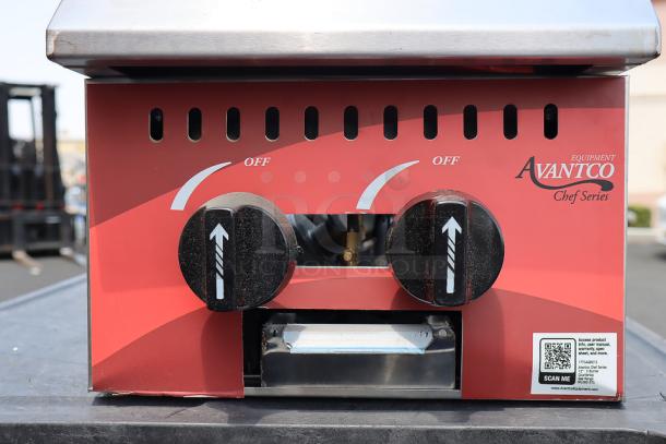 Brand new Avantco Chef Series CAG-R-2-12 gas range, 12" 2-burner, 50,000 BTU, missing burner components, scratches, dents.
