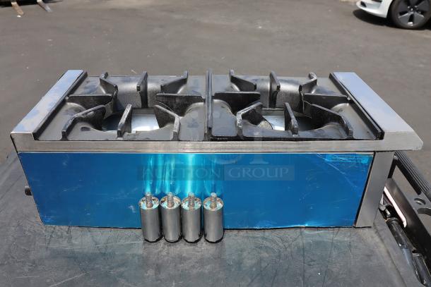 Avantco Chef Series 12" 2-burner gas range model CAG-R-2-12, 50,000 BTU, missing components, scratches and dents visible.