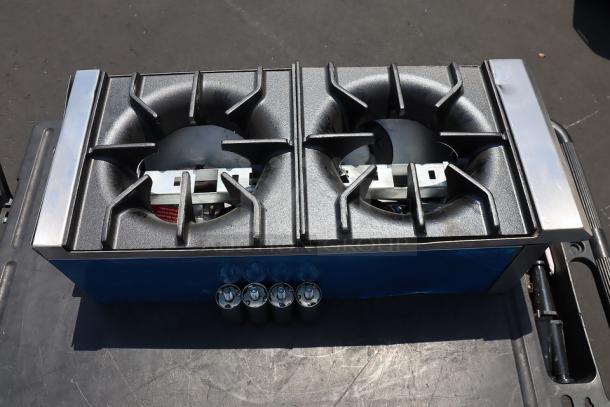 Avantco Chef Series CAG-R-2-12 gas range, 12" 2-burner, 50,000 BTU, adjustable legs, missing burner parts, scratches, dents.