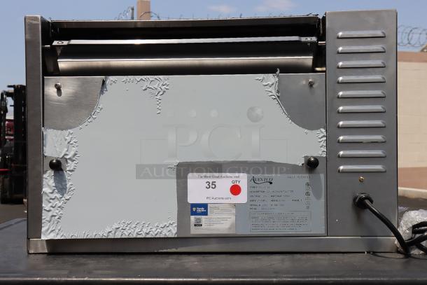 Brand new Avantco BT18A vertical contact conveyor bun toaster with visible scratches and dents. Serial number 2302124184BT18A.