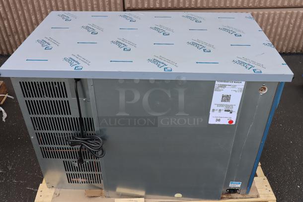 Hoshizaki IM-200BAC ice machine, 39.5", air cooled, 188 lb, 115V. New condition. Features protective shipping cover. Serial: P01845F.