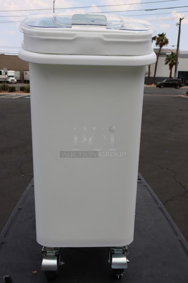 Brand new Baker's Lane 21-gallon white mobile ingredient bin with slant top, sliding lid, and scoop. No damage or defects.