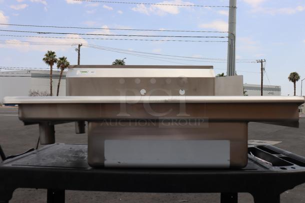 Regency 600DDT36L soiled dish table with left drainboard, stainless steel legs, includes bent upper backsplash corner.