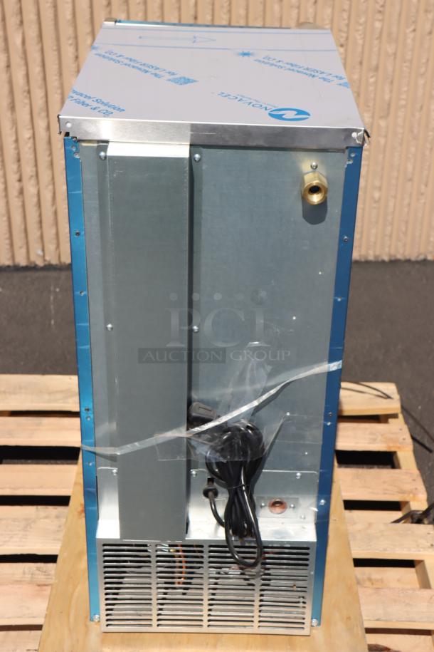 New Hoshizaki AM-50BAJA undercounter ice machine. Air cooled, 51 lb capacity. S/N: P34626L. Brand markings visible.