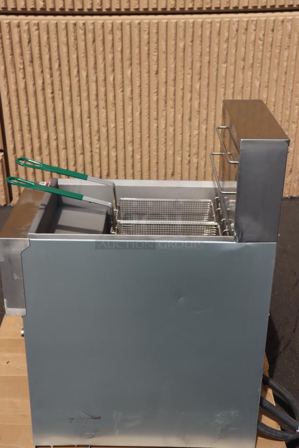 BRAND NEW Avantco EF40-240-3 40 lb. electric floor fryer, 240V, 34 Amps, 3 phase, 14 kW. Visible dent on the side panel.