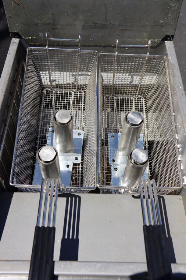 Wolf by Vulcan WF400-1 natural gas floor fryer with dual baskets, 45-50 lb. capacity, 120,000 BTU. S/N: DV 1198655.