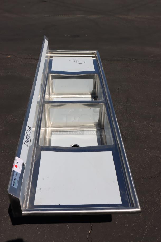 BRAND NEW Regency 600S22323224 96" stainless steel two-compartment sink, minor dents, with tags; damage noted.