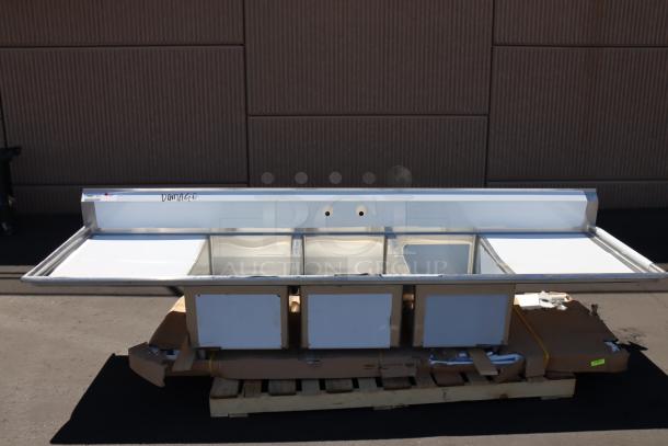 Regency 600S32030230 124" stainless steel commercial sink with 3 compartments, 2 drainboards, minor dents; new without packaging.